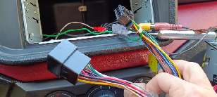 The wires behind the car radio