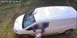 Security camera showing post delivery.