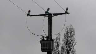 A pole-mounted transformer.