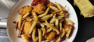 Chicken nuggets and home-made chips