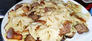 Farfalle with fried onions and burger bits