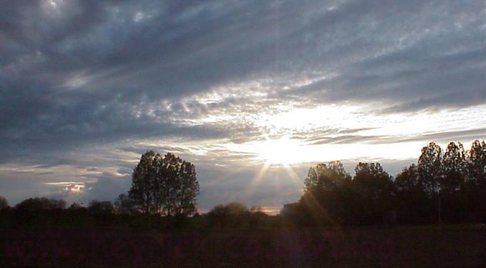 Sun breaking through clouds