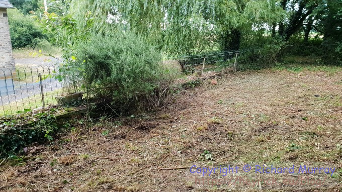 The front wall of the potager.