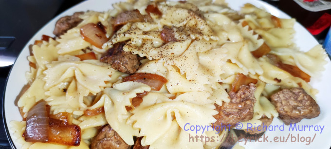 Farfalle with fried onions and burger bits