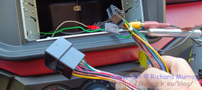 The wires behind the car radio