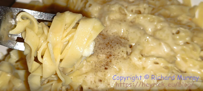 Tagliatelle, butter, pepper, and some grated cheese.