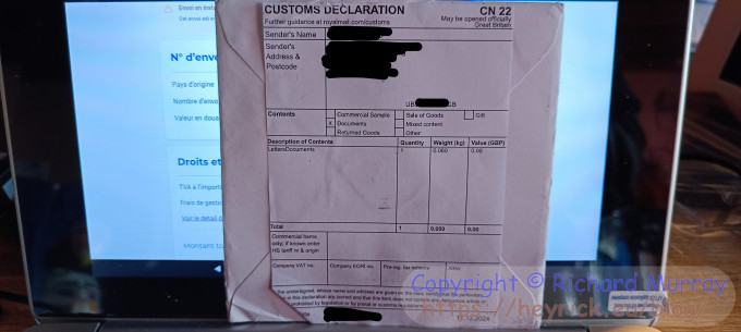 A customs sticker on a card.