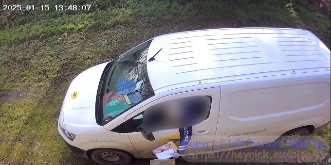 Security camera showing post delivery.