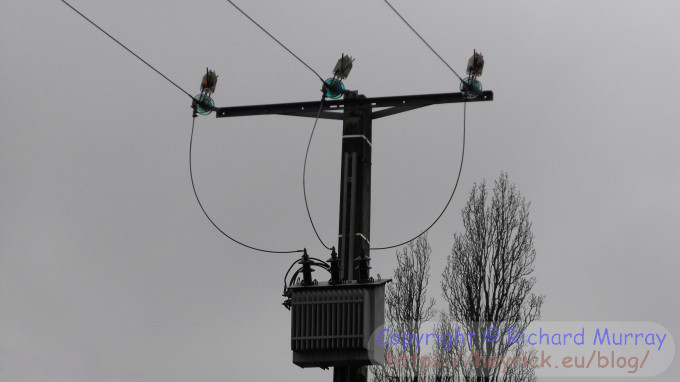 A pole-mounted transformer.