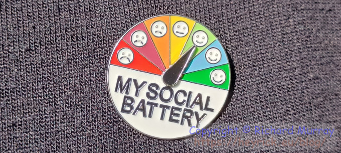 A social battery badge.
