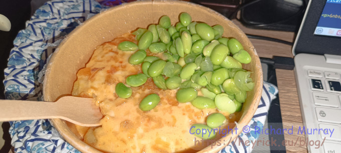 Cheesy hash browns and soy beans.