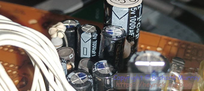 A photo of capacitors on a different circuit board.