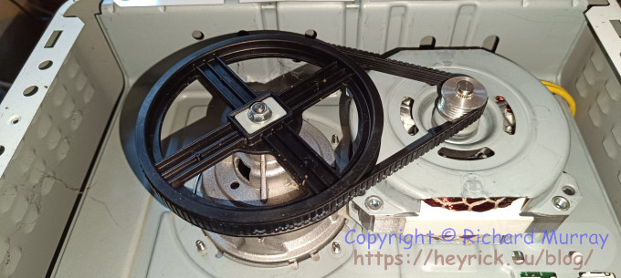 The motor and drive belt.