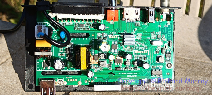A motherboard sunbathing on a deck chair.