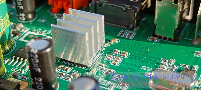 A closeup of a tiny processor that is the heart of the receiver.