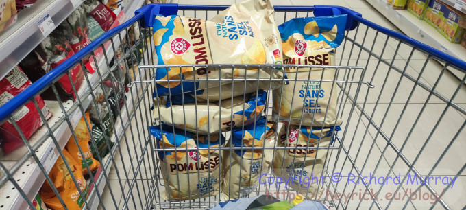 Lots of bags of crisps in my trolley.