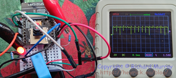 A picture of an oscilloscope showing a noisy input.