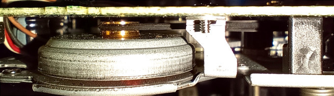 A photo of the motor and drive belt.