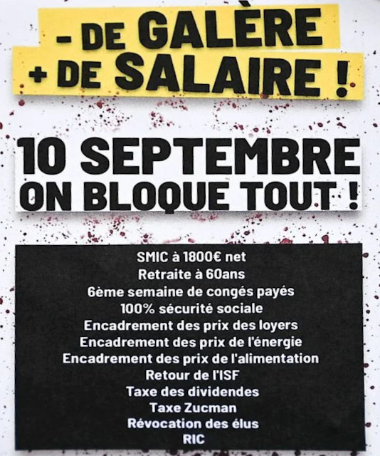 A protest sign calling for a total strike