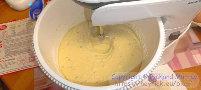 Mixing cake mix.