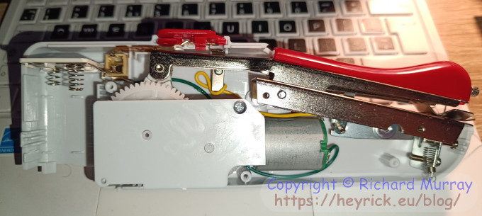 The needle pushed down.