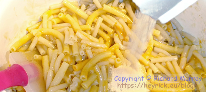 Adding the cheese powder.