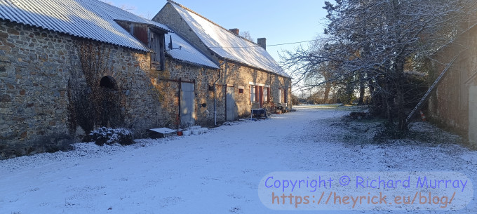 Snow, looking up the front of the house.
