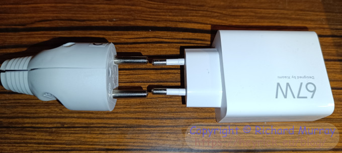 A USB charger beside a normal plug.