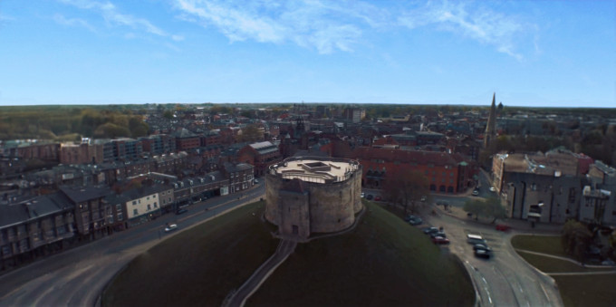 A castle in York with fake surroundings and a fake sky.