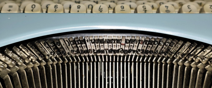 The typebars of a mechanical typewriter.