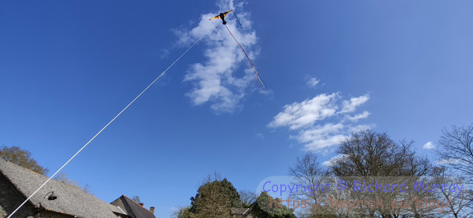 Flying a kite.